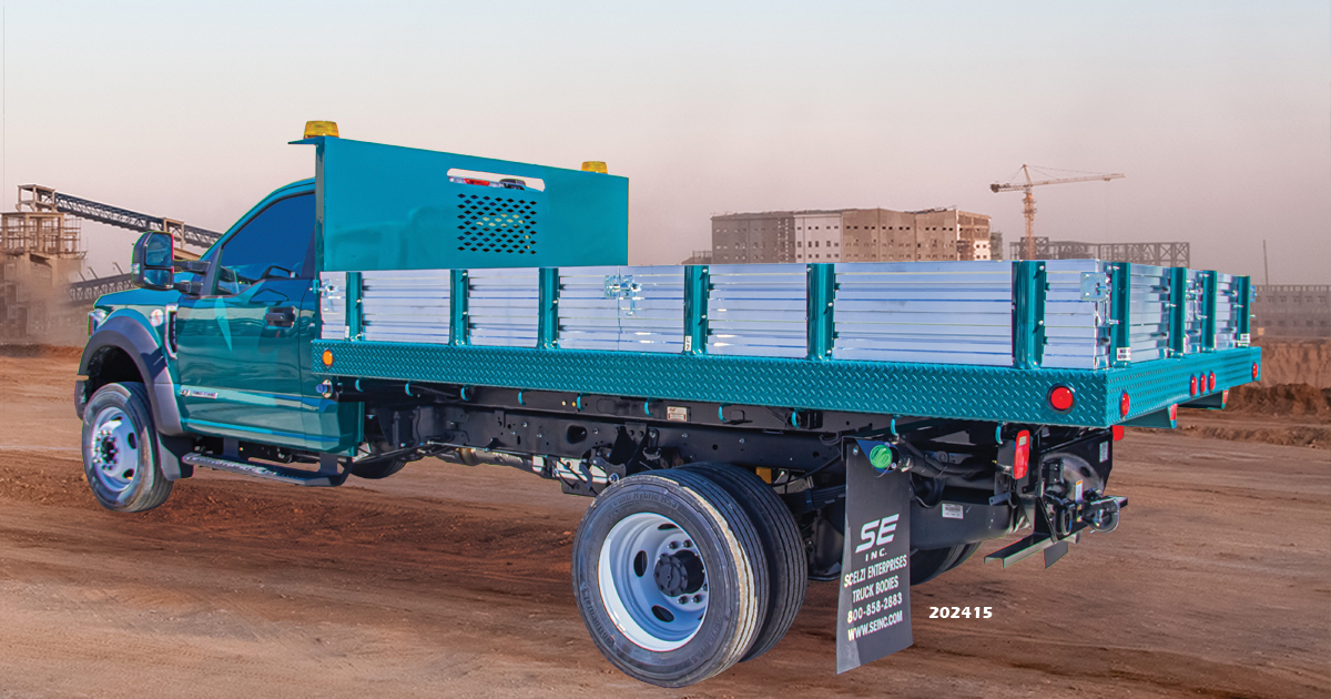 Scelzi green flatbed truck body with aluminum stakes